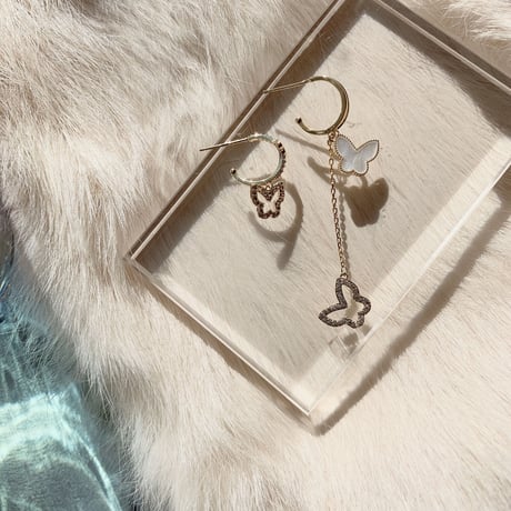 butterfly shell × stone asymmetry pierce