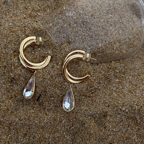 gold hoop × clear drop pierce