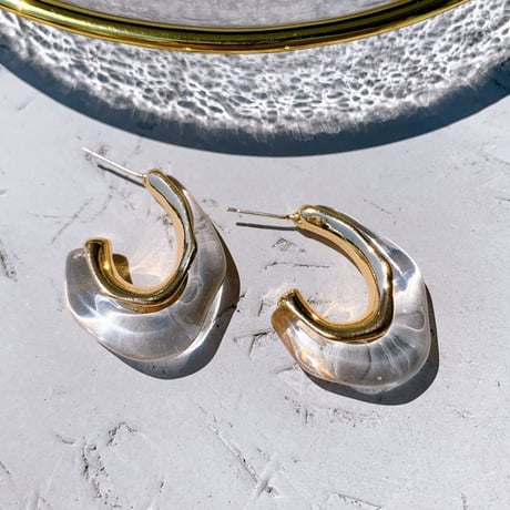 clear × gold hoop pierce