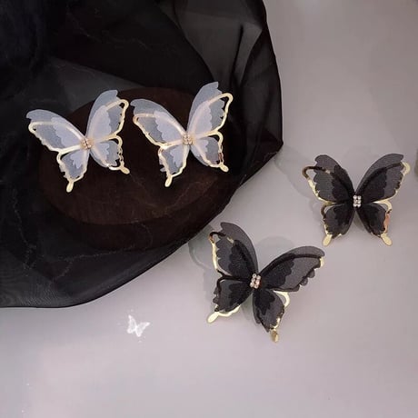see-through × gold butterfly pierce