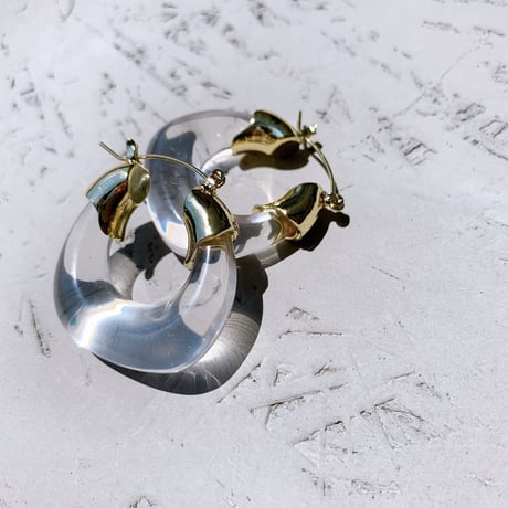 clear × gold hoop pierce