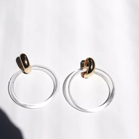 clear × gold pierce