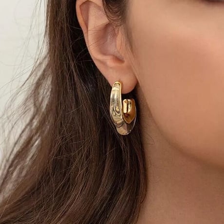 clear × gold hoop pierce