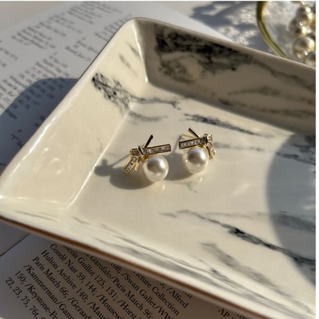 ribbon × pearl pierce