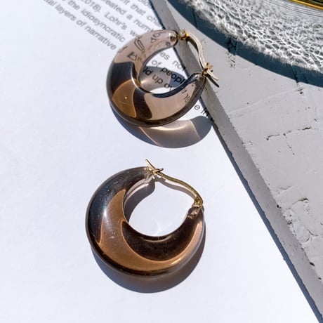 clear brown hoop pierce