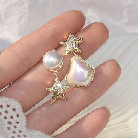 star × aurora pearl asymmetry pierce