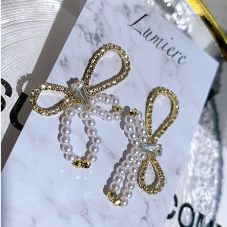stone × pearl ribbon  pierce