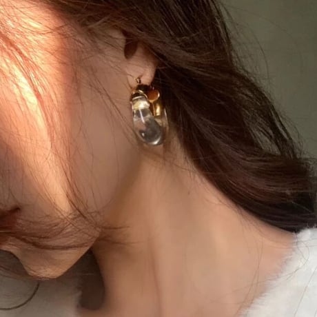 clear × gold hoop pierce