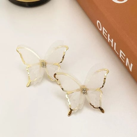 see-through × gold butterfly pierce