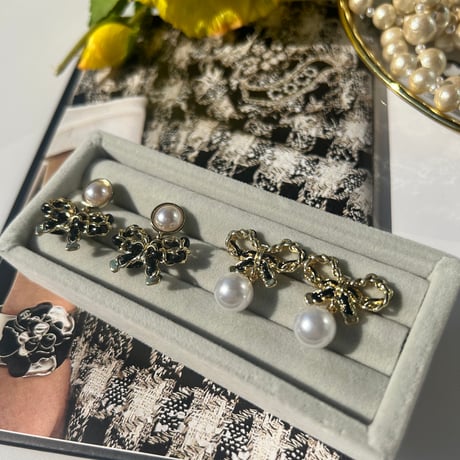 black ribbon × pearl pierce