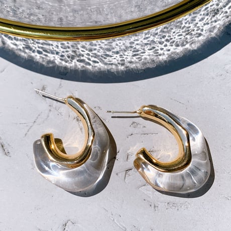 clear × gold hoop pierce