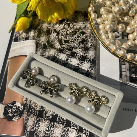 black ribbon × pearl pierce