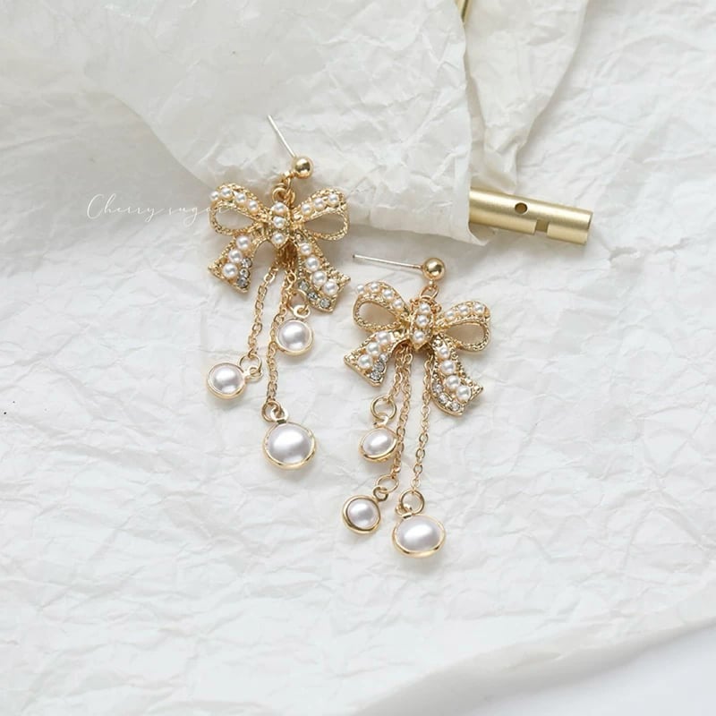 即納】リボンビジューパールピアス/イヤリング | Cherry Sugar 即納】リボンビジューパールピアス/イヤリング | Cherry Sugar