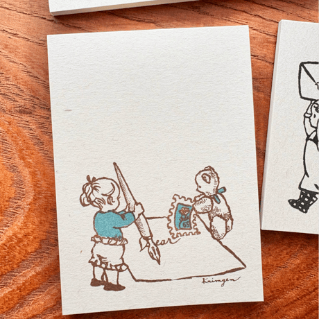 "Writing a Letter (Green)" memo pad