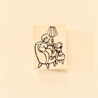 No. 255 "Reading on Sofa" rubber stamp