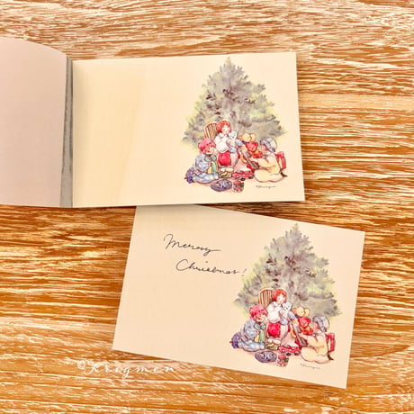"Three kids opening gifts" memo pad メモ帳