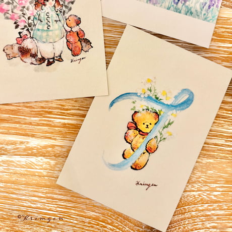 25K-11: "T (with bear)" postcard