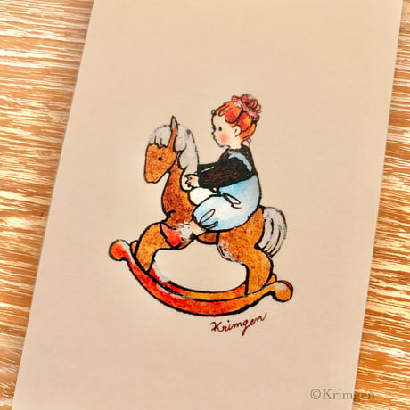 25K-56: "Girl riding a rocking horse"  postcard