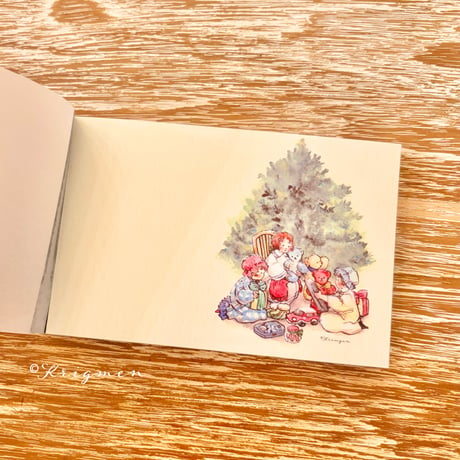 "Three kids opening gifts" memo pad メモ帳