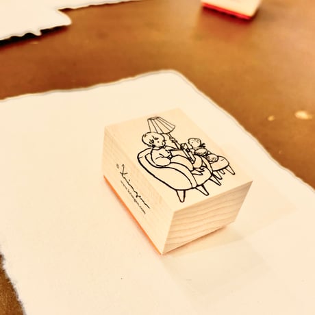 No. 255 "Reading on Sofa" rubber stamp