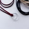 Benjamin glass twist ring necklace