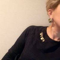 Italian designer's frill brooch