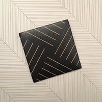 Italian designer's ebony brooch