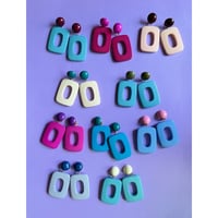 Milanese designer's resin earrings &pierces