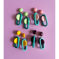 Milanese designer's resin earrings & pierces