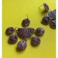 Italian designer's raffia pierces