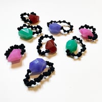 Italian designer's hair tie & bracelet
