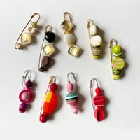 Venezian designer's pin brooch