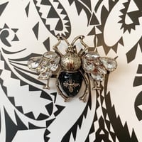 Italian designer's bee brooch