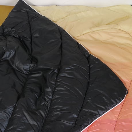 RUMPL ORIGINAL PUFFY BLANKET  Dawn Pixel Fade