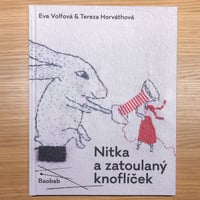 Nitka a zatoulany knoflicek