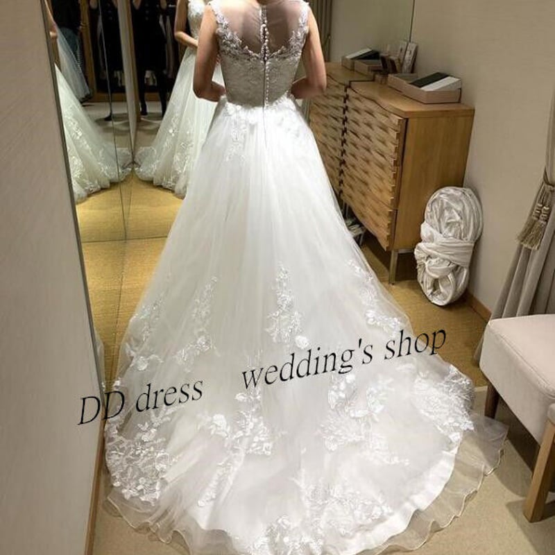 ホワイト Vネックドレス 背中見せ 出くわす プリンセスライン 編み上げ  