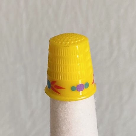 Thimble・イエローにオレンジの模様