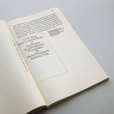 61 books with black type on white cover