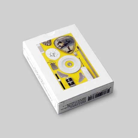 Jonathan Monk / A collection of nine Kippenberger editions, one Boetti watch, a cigarette and yellow