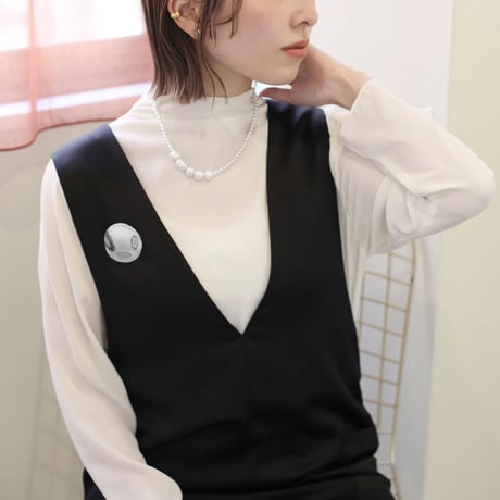flat metal brooch