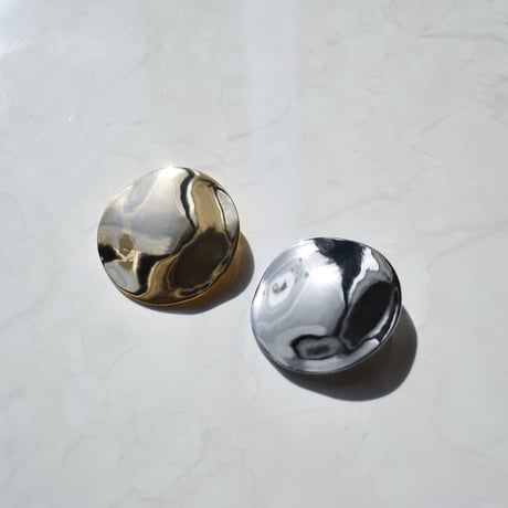 flat metal brooch