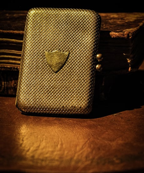 Emblem compact case