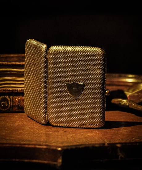 Emblem compact case