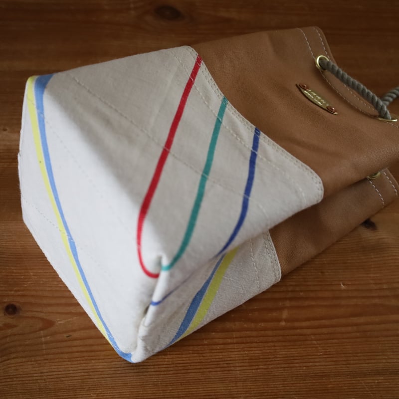 SHUTTLE-R10 -24.0 / 岡山倉敷9号パラフィンキャンバス 巾着バッグ /