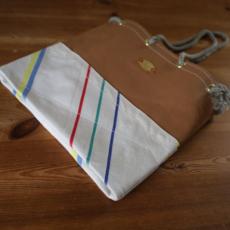 SHUTTLE-R10 -24.0 / 岡山倉敷9号パラフィンキャンバス 巾着バッグ /