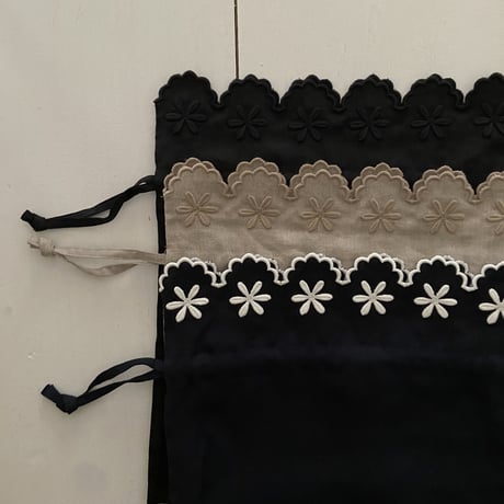 オールドマンズテーラー FLOWER SCALLP DRAWSTRING BAG
