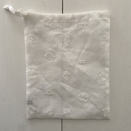 オールドマンズテーラー MONOGRAM EMBROIDERY DRAWSTRING BAG Sサイズ