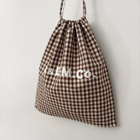 オールドマンズテーラー GINGHAM CHECK DRAWSTRING BAG(L)・Brown