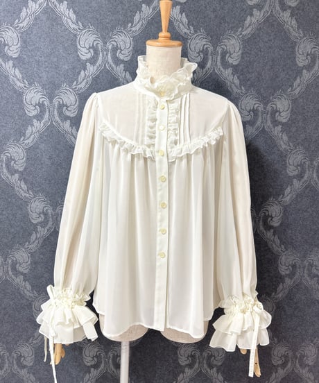 Enchantlic Enchantilly／シャンテリーフリルブラウス（生成り）