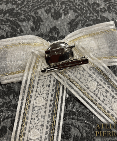 ATELIER-PIERROT／Ribbon Cross Charm Clips（White×goldライン）2個1セット